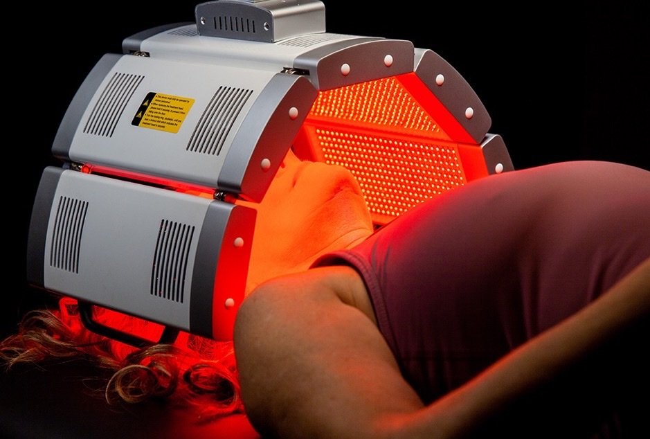 Client receiving a POLY Pro red light facial treatment